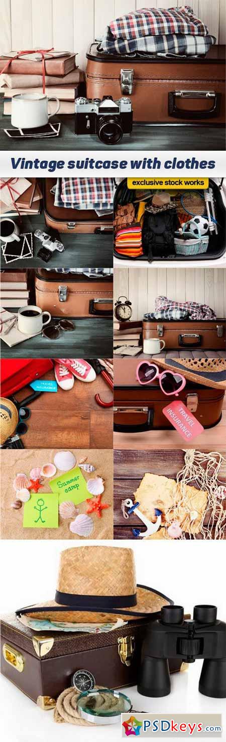 Vintage suitcase with clothes and books on wooden background - 10 UHQ JPEG