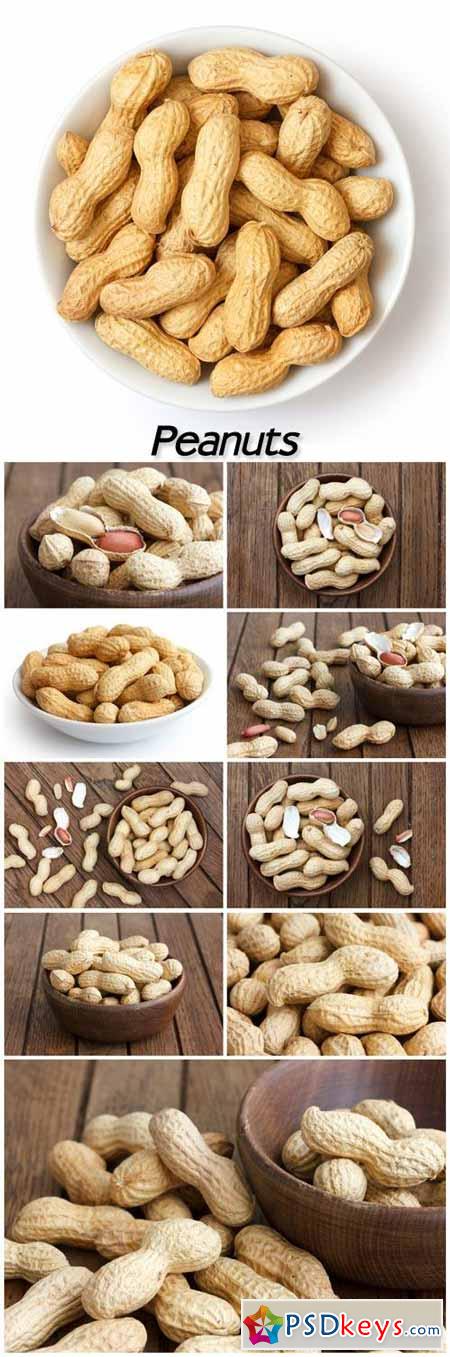 Peanuts, bowl with peanuts on wooden background