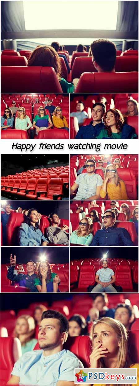 Happy friends watching movie in theater