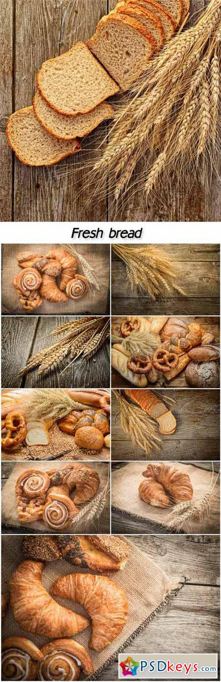 Fresh bread and wheat on the wooden