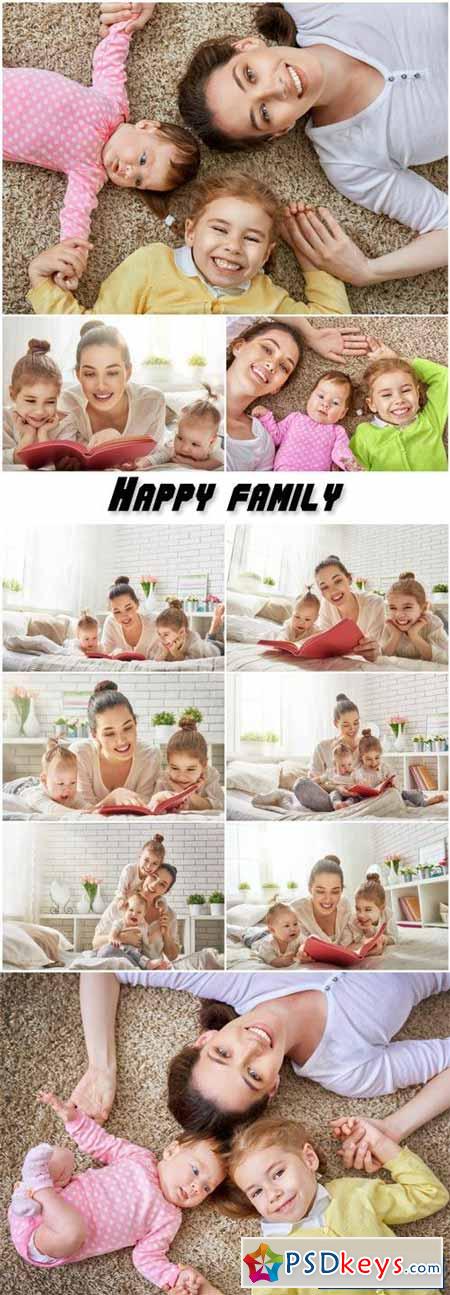 Happy family, mother reading a book