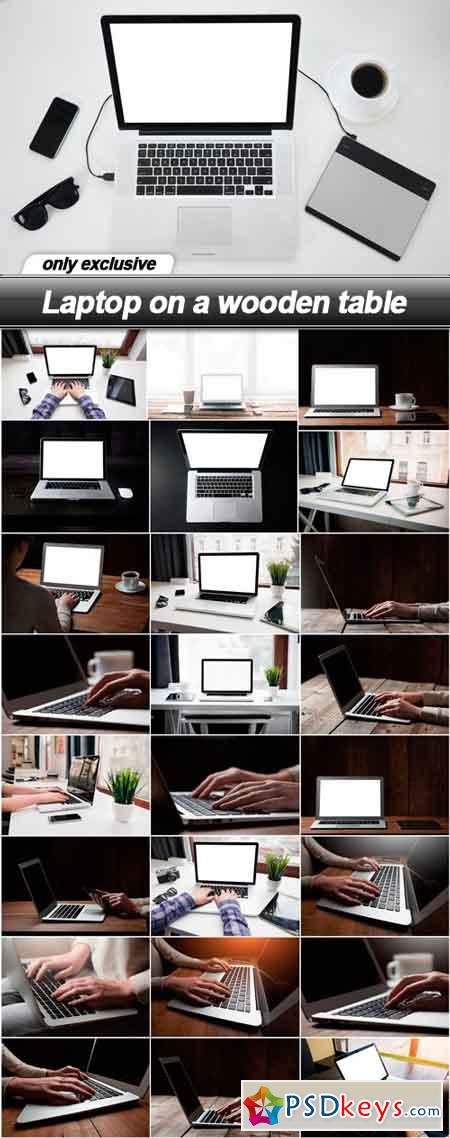 Laptop on a wooden table - 25 UHQ JPEG