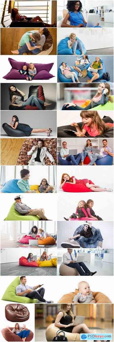 Woman a man a child on an inflatable chair couch relaxing holiday joy 25 HQ Jpeg