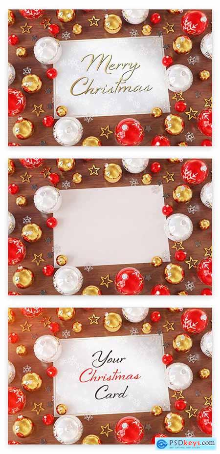 Christmas Card on Wooden Desk with Ornaments Mockup 223233322
