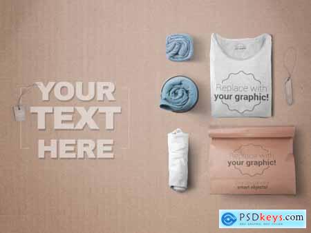 3 Rolled T-Shirts and 1 Folded T-Shirt with Paper Bag Mockup 319878078