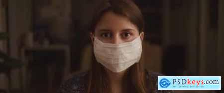 Portrait of A Young Woman Putting on A Protective Mask Close Up 26305253