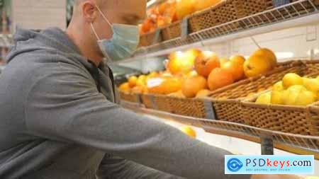 Man with Medical Face Mask Selects Lemons in Store Guy Choose Fruits in Supermarket Purchase Food 26163414
