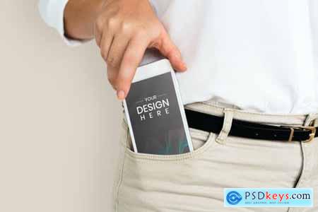 Man getting his phone from his pants pocket with screen mockup 844061