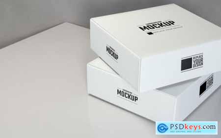 Display white square cardboard boxes mockup