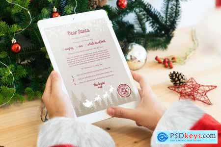 Santa Claus hands with a white tablet mockup