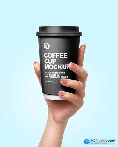 Coffee Cup in a Hand Mockup 56737