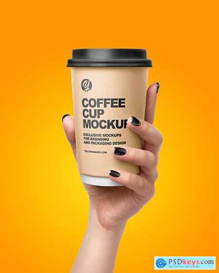Coffee Cup in a Hand Mockup 56737