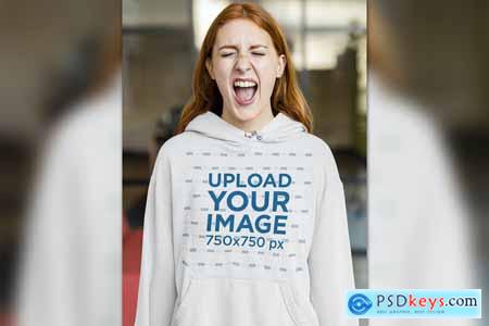 Pullover Hoodie Mockup Featuring a Woman Yelling