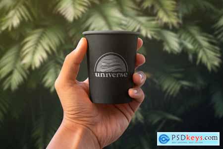 Hand Holding Paper Coffee Cup Mockup