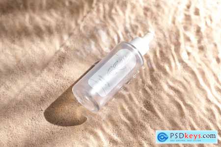 Serum Bottle on Sand and Water Wave Background NEAM7EJ
